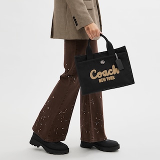 Foto 5 | Foto 5 | Bolsa Coach Cargo Tote De Lona Y Cuero Reciclado - Venta Internacional.
