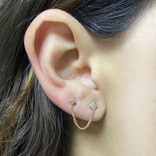 Foto 2 | Foto 2 | Piercing Mancini Cuadrado Dorado Zirconia