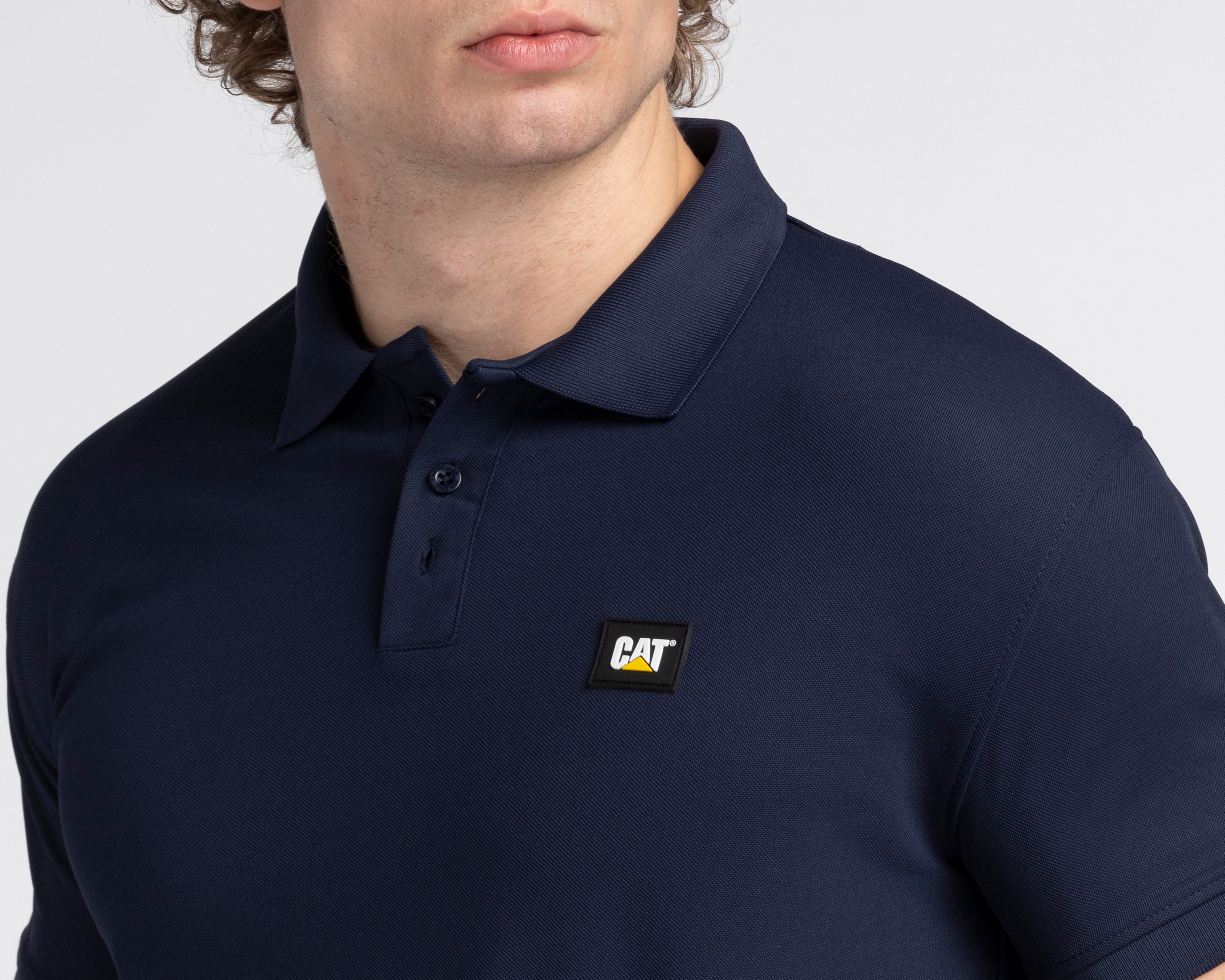 Foto 4 pulgar | Foto 3 | Playera Polo CAT Azul Marino para Hombre