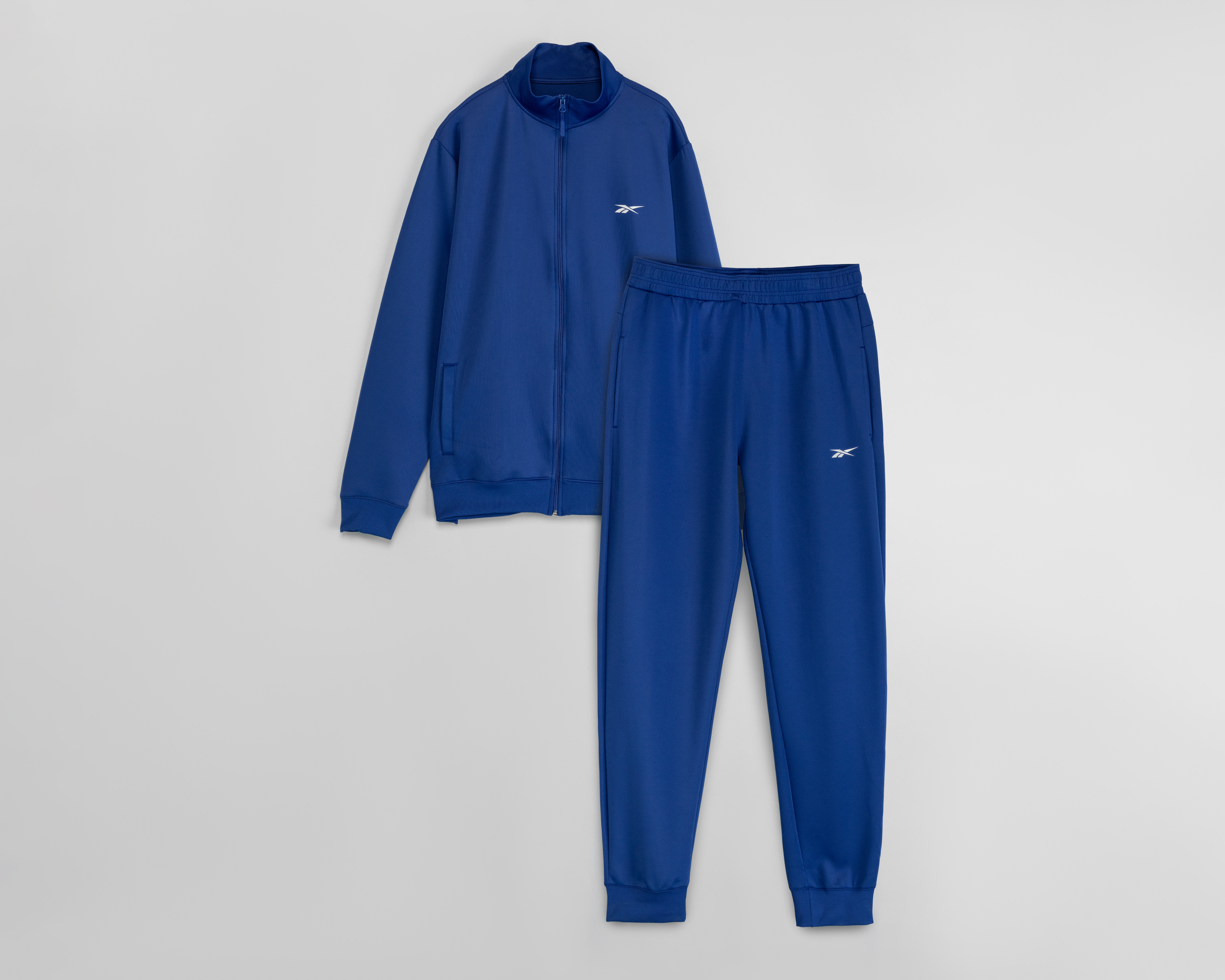 Foto 2 pulgar | Foto 1 | Conjunto Deportivo de Chamarra y Pants Reebok para Hombre