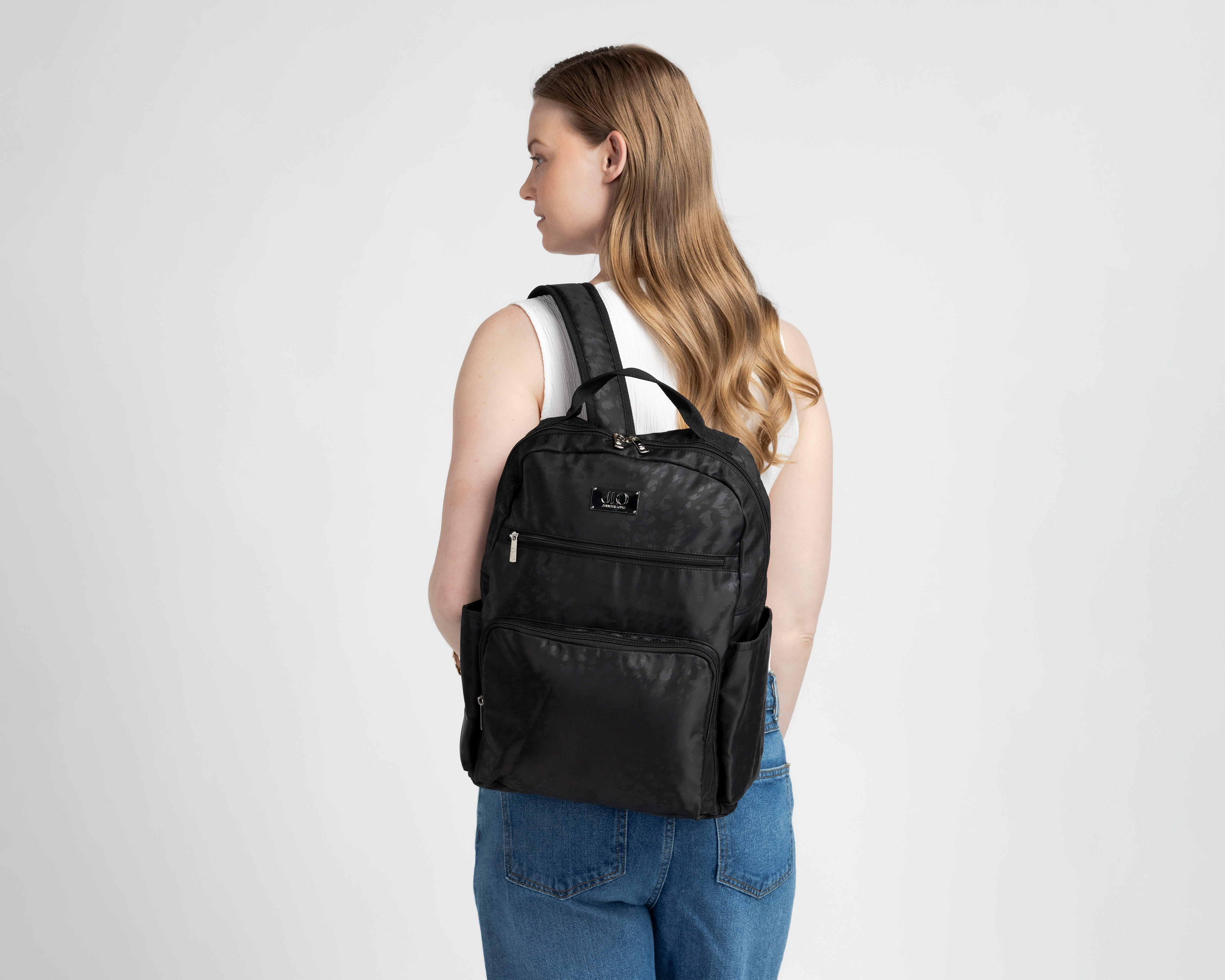 Foto 9 pulgar | Foto 8 | Mochila Jennifer Lopez Escolar