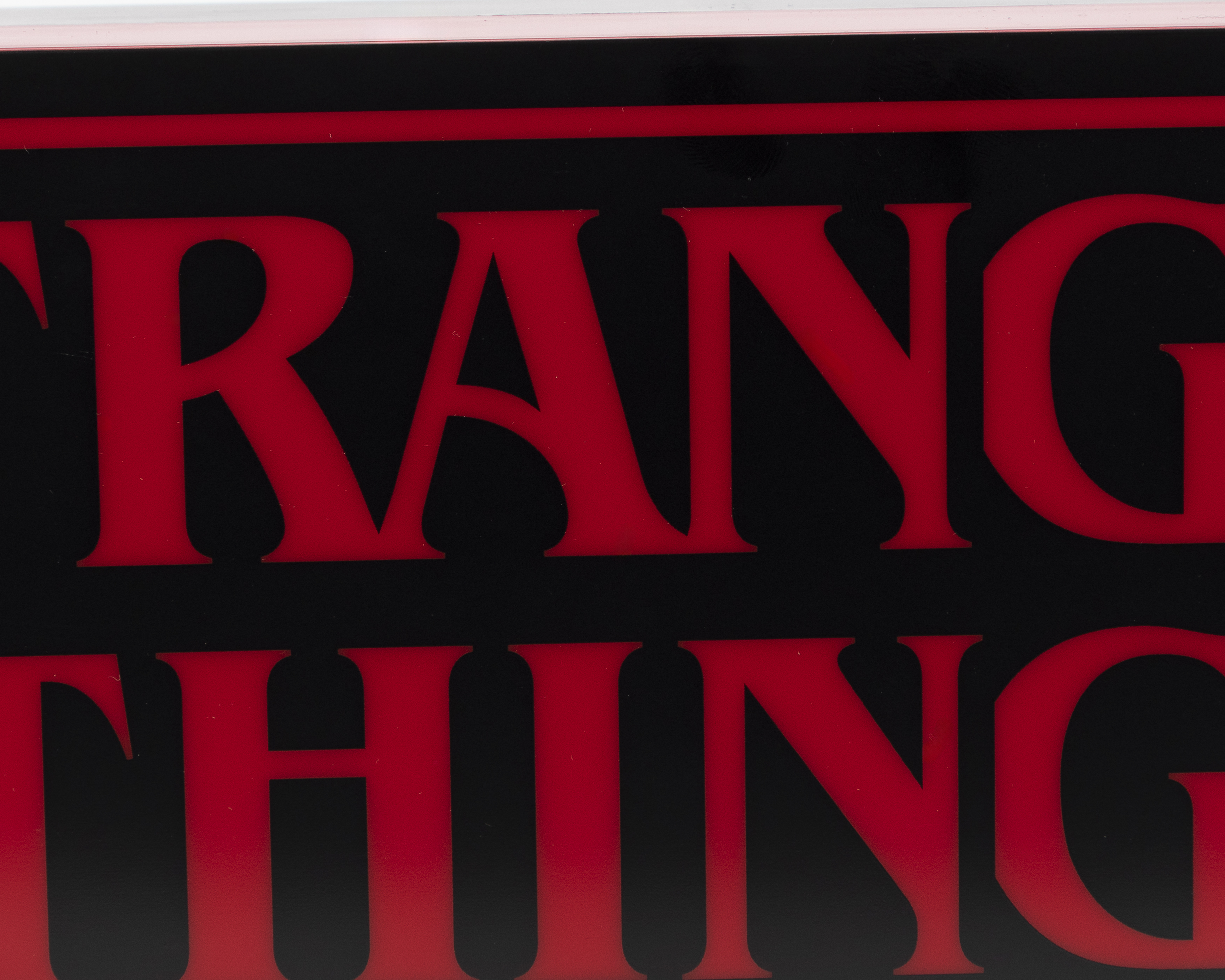 Foto 3 pulgar | Foto 2 | Logo Stranger Things con Luz