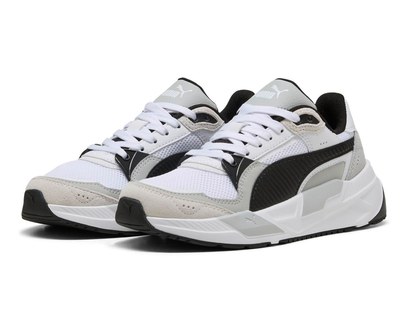 Foto 2 pulgar | Foto 1 | Tenis Puma Trinity 2 Juveniles